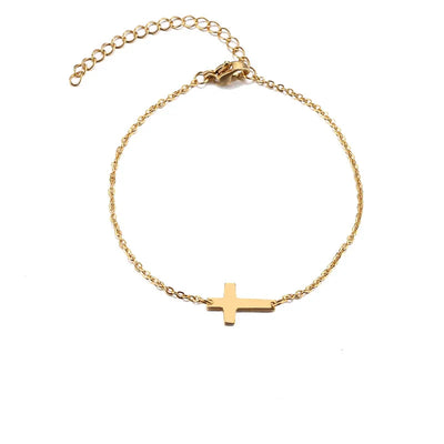 Zartes goldfarbenes Armband mit Kreuzanhänger