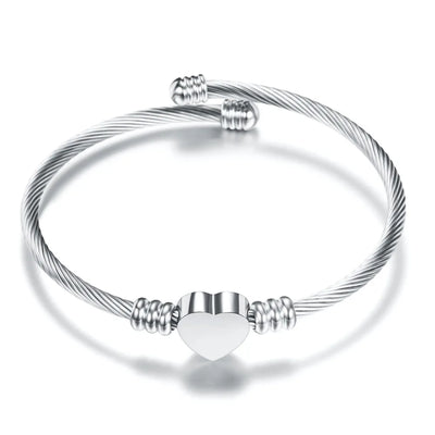 Flexibles Armband mit Herz-Detail in Gold