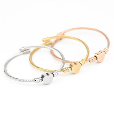 Flexibles Armband mit Herz-Detail in Gold