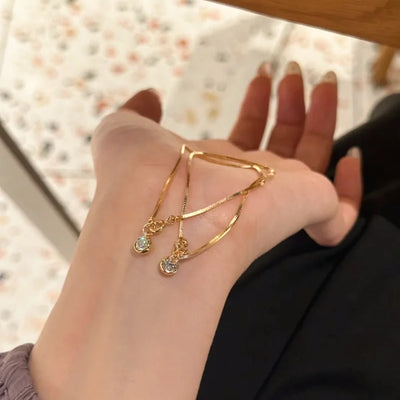 Lumi Armband – Zarte Eleganz mit Kristallanhänger (Gold & Silber)✨