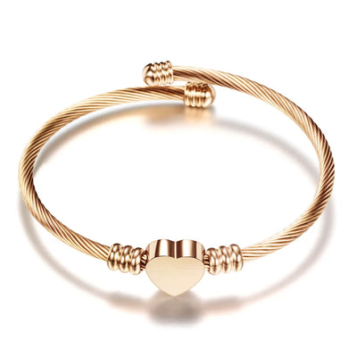 Flexibles Armband mit Herz-Detail in Gold