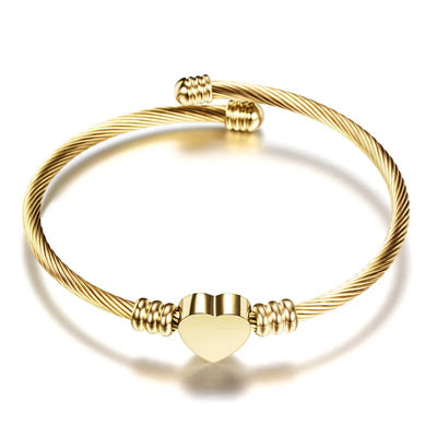 Flexibles Armband mit Herz-Detail in Gold