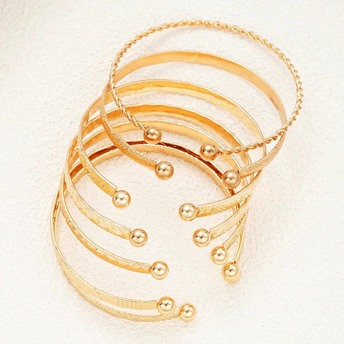 Golden Glow✨ – 7er Armreifen-Set für deinen Shine Moment 💫
